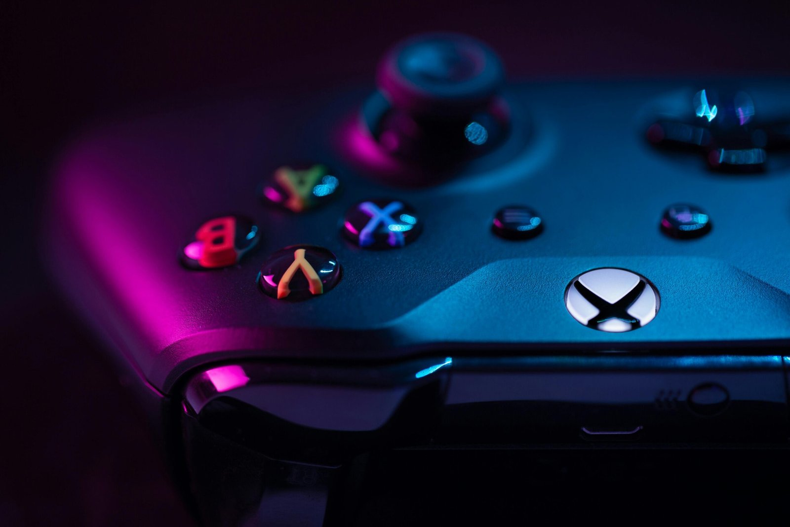 Detailed image of a game controller with colorful LED lighting